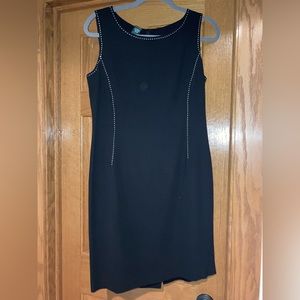 Black dress with minimal white embroidery